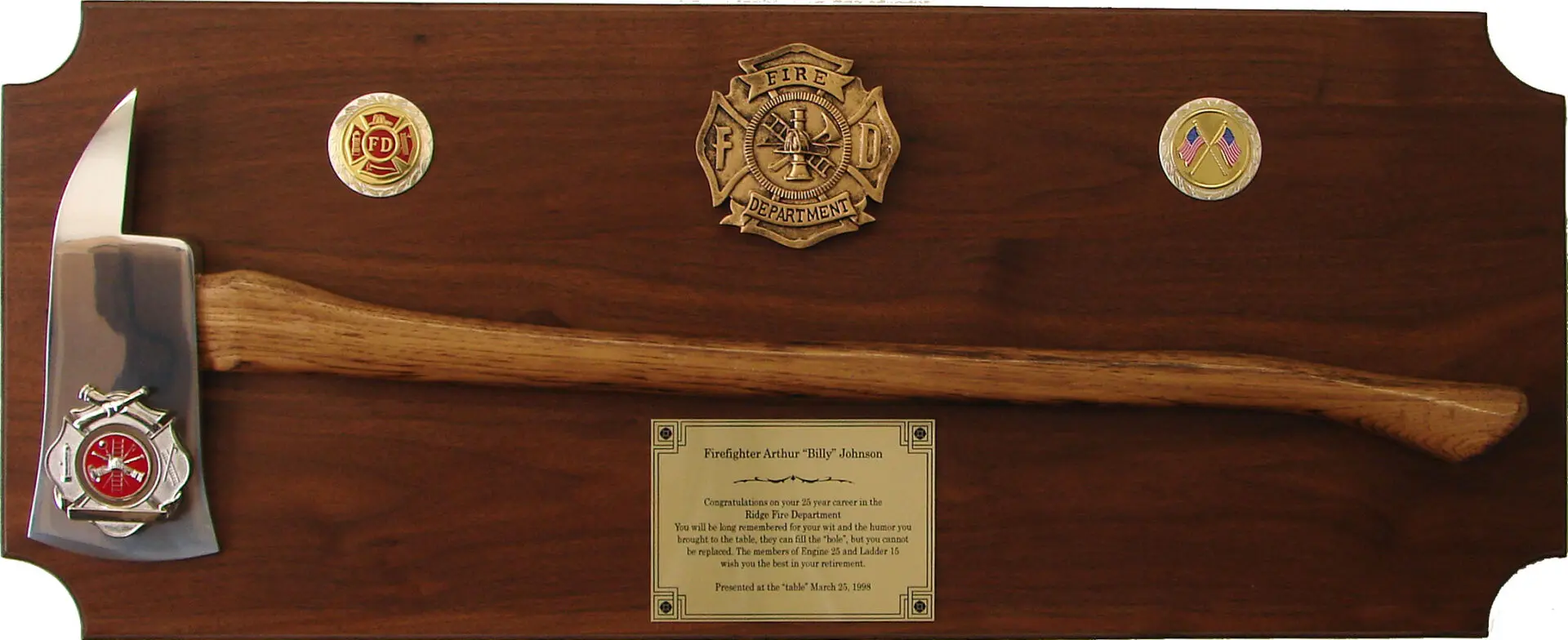 fire department axe with two badges